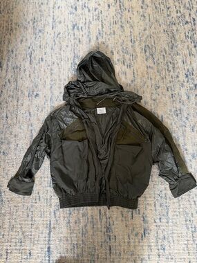 Hooded Dark Olive Green Rain Jacket with Zip Pockets and Faux Suede detailing